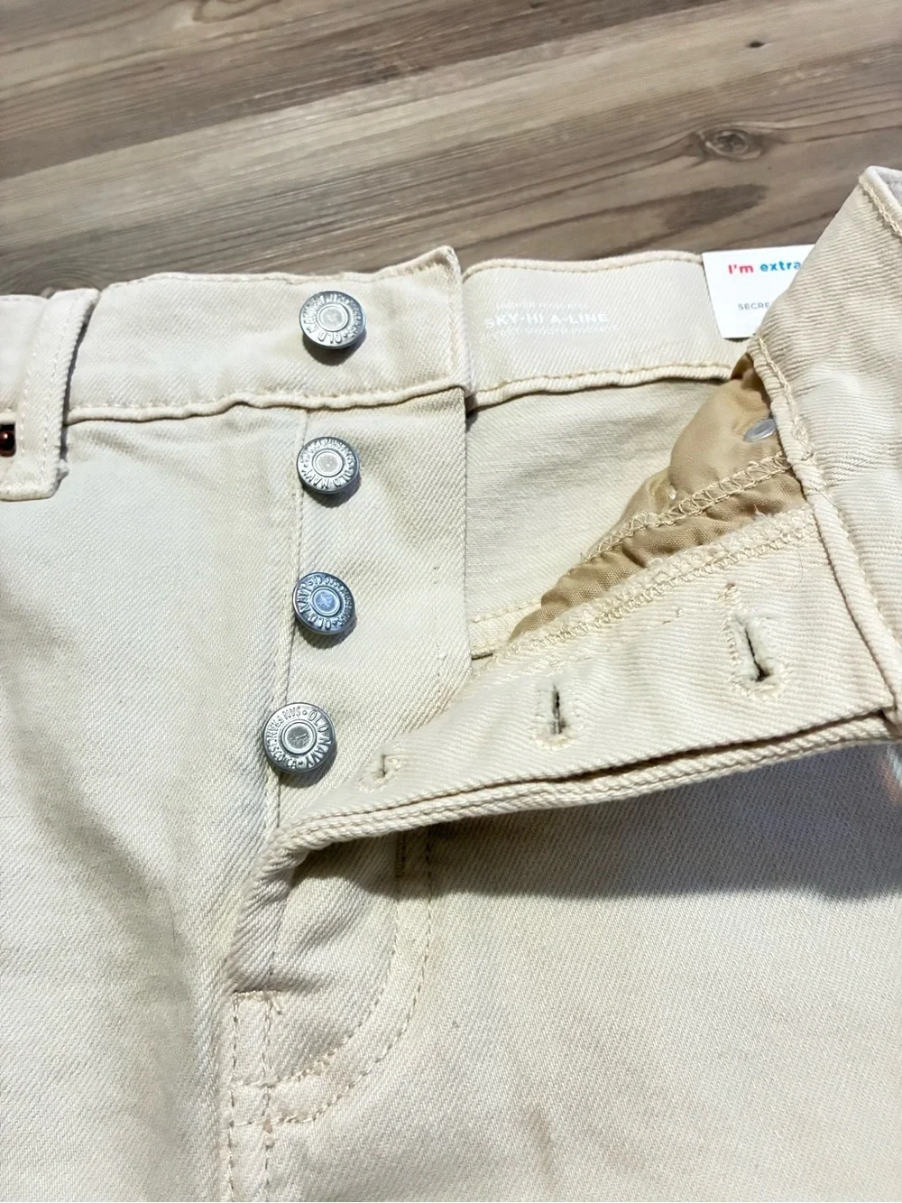 Old Navy Sky-hi A-line 3” denim short Ecru Size 12 Hidden button fly Raw hem NWT